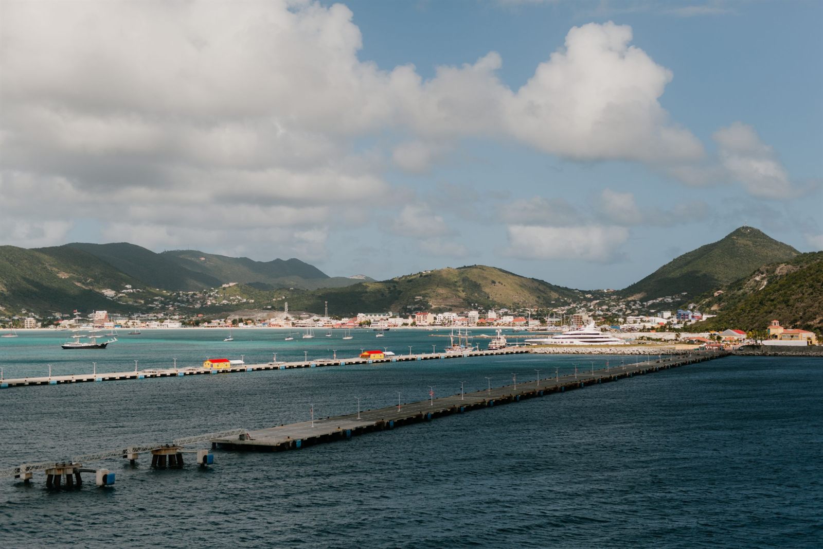 Long cruise pier stretching across Great Bay toward Philipsburg and the hills of St. Maarten